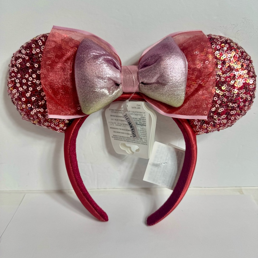 NWT. Disney pink sparkle sequin ears headband.